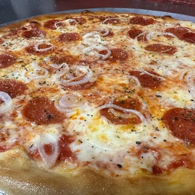 LG Meat Lovers Covered Stuffed Pizza.